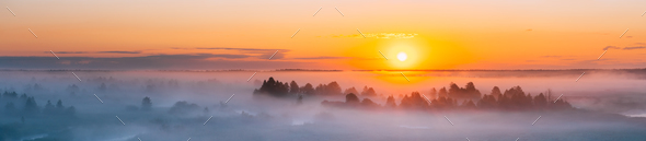 Amazing Sunrise Over Misty Landscape. Scenic View Of Foggy Morni - Stock Photo - Images