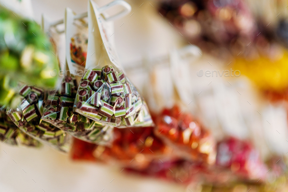Colorful caramel sweets in transparent bags - Stock Photo - Images