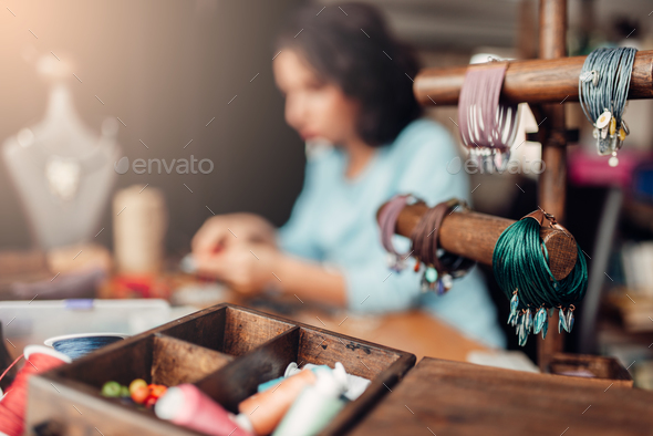 Needlework tools, master at workplace in workshop - Stock Photo - Images