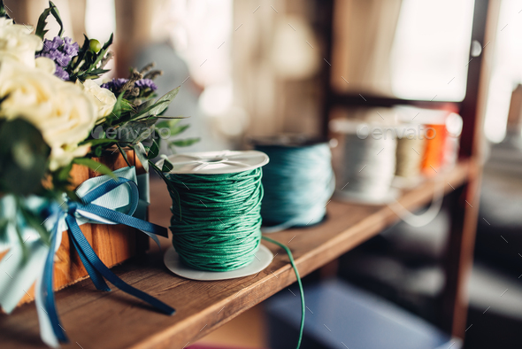 Needlework, coil with red decorative rope, closeup - Stock Photo - Images