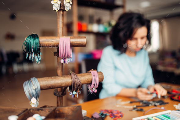 Needlework tools, master at workplace in workshop - Stock Photo - Images