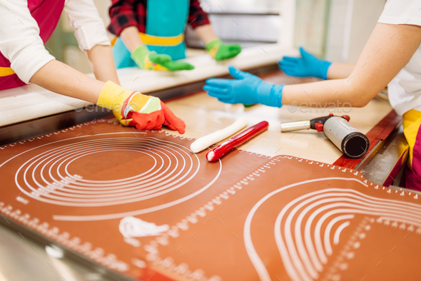 Little girl and boy learn to make caramel - Stock Photo - Images
