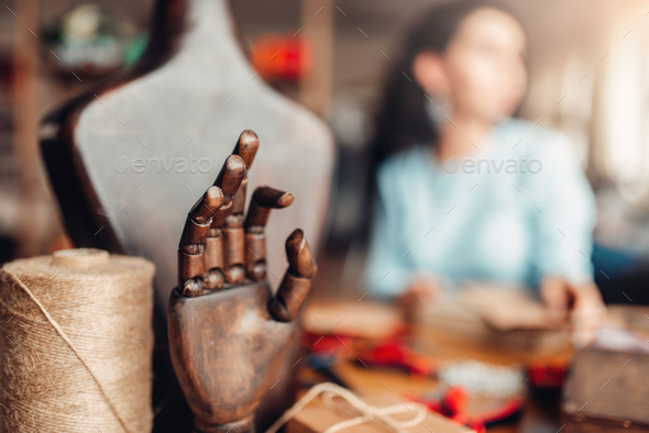 Needlework tools, wooden hand and mannequin, - Stock Photo - Images