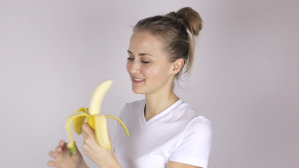  Young Woman with Banana