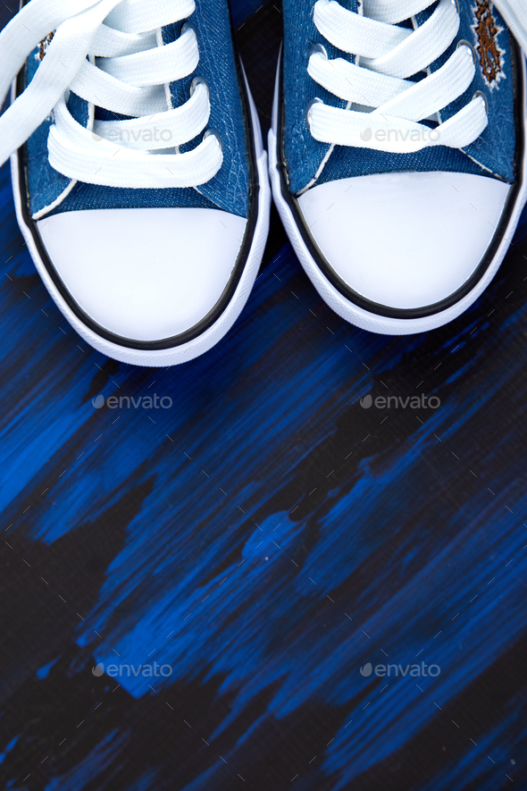 Flat lay of female or male sneakers shoes - Stock Photo - Images