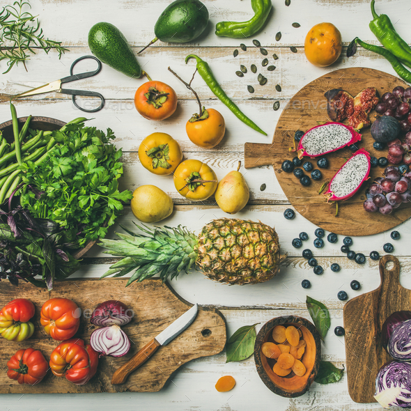 Helathy vegan food cooking background with uncooked fruites and vegetables - Stock Photo - Images