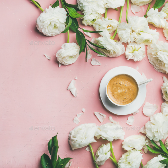 Flat-lay of cup of coffee and ranunculus flowers, square crop - Stock Photo - Images