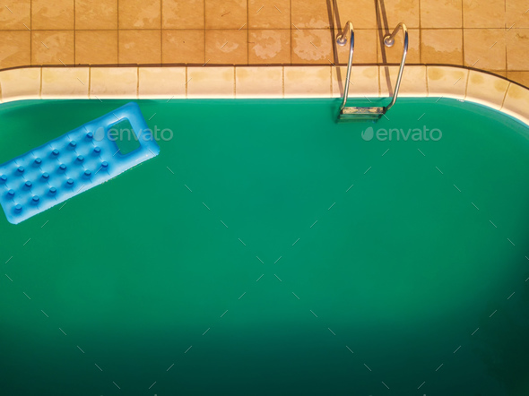 Aerial view of inflatable mattress in swimming pool - Stock Photo - Images