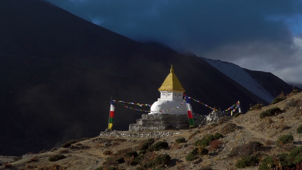 Buddhist Stupa and Snow Mountain alt
