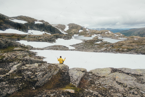 Typical norwegian landscape with snowy mountains - Stock Photo - Images