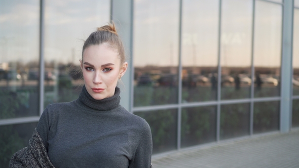 Happy Smiling Businesswoman Looking at Camera Outside While Working at Modern Business Center alt
