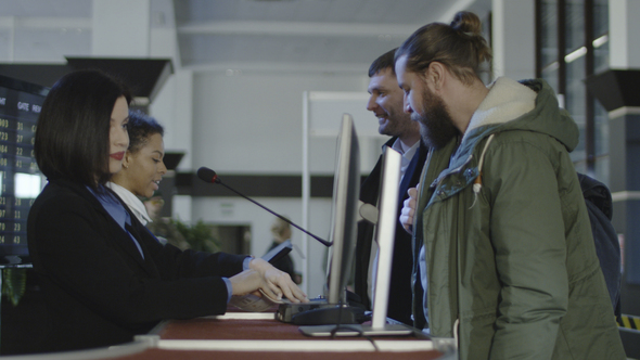 Airport Security Personnel Checking Identification alt