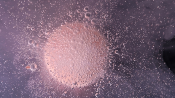 Round Candy Similar To a Tablet, Dissolves in Water, Releasing Bubbles alt