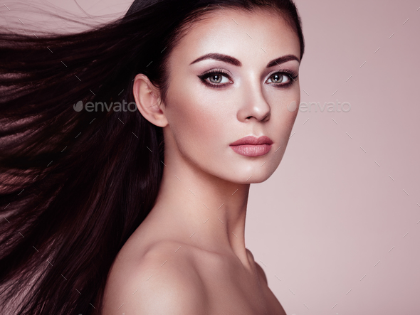 Beautiful woman with long smooth hair - Stock Photo - Images