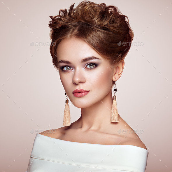 Brunette woman with elegant and shiny hairstyle - Stock Photo - Images
