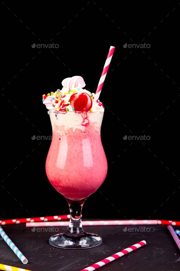 Pink Extreme milkshake with berry rasberry Stock Photo by bondarillia