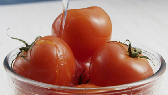 of Washing Tomatoes in Bowl alt