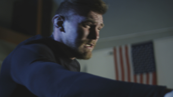 Sportsman Working on Air Bike alt