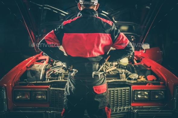 Vintage Car Repair Challenge - Stock Photo - Images