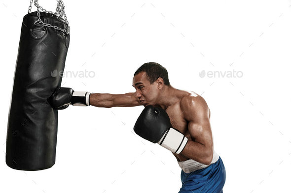 Sporty man during boxing exercise making hit. Photo of boxer on white background - Stock Photo - Images