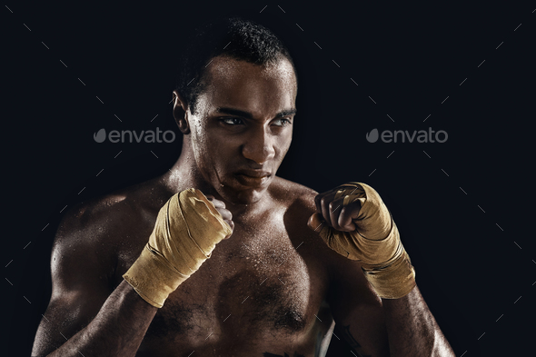 Afro man boxing and training over black background - Stock Photo - Images