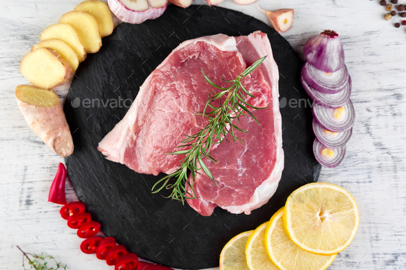 Raw pork meat with spice ingredient - Stock Photo - Images