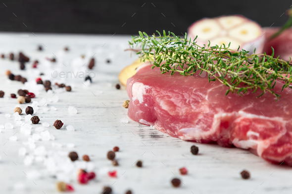 Raw pork meat with spice ingredient - Stock Photo - Images