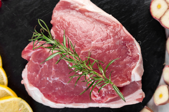 Raw pork meat with spice ingredient - Stock Photo - Images