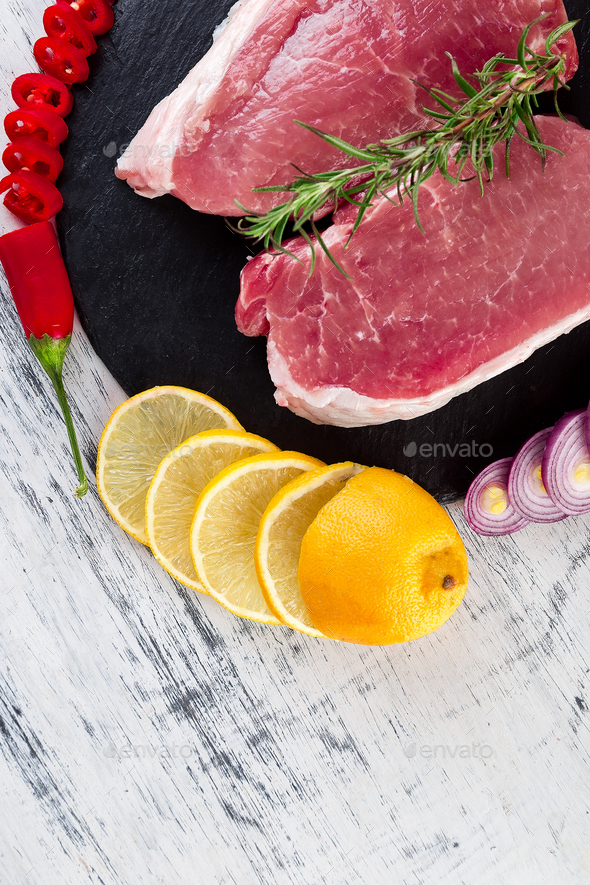 Raw pork meat with spice ingredient - Stock Photo - Images