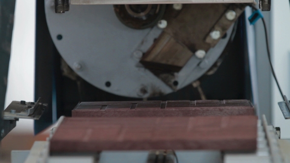 Plastic Tile From Stamping Press in Plastic Recycling Factory