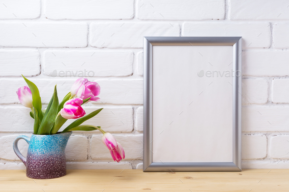 Silver frame mockup with pink tulip in purple blue vase - Stock Photo - Images