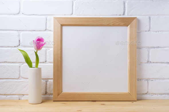 Wooden square frame mockup with pink tulip - Stock Photo - Images