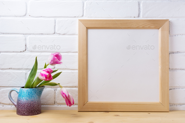 Wooden square frame mockup with pink tulip in purple blue vase - Stock Photo - Images