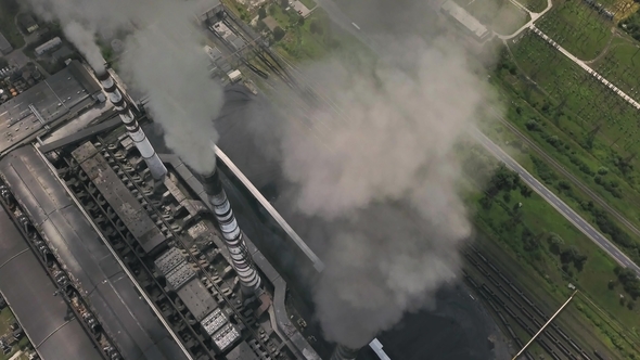 Power Station with Steaming Chimneys