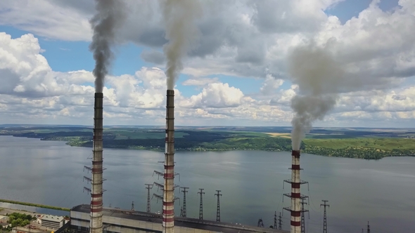 Power Station with Steaming Chimneys