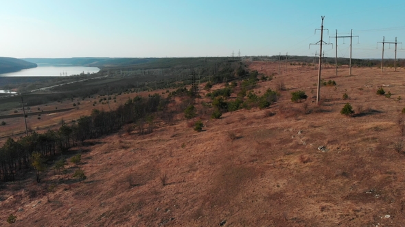 Aerial View From Drone. Flying Over Autumn Slope with Trees and River. Beautiful Green Mountain alt