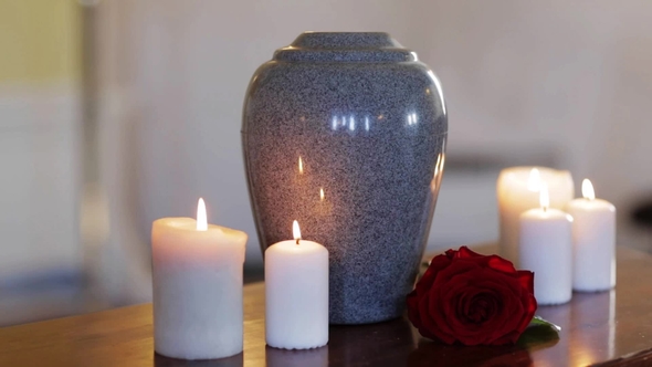 Funerary Urn and Candles on Table Burning Indoors 13 alt
