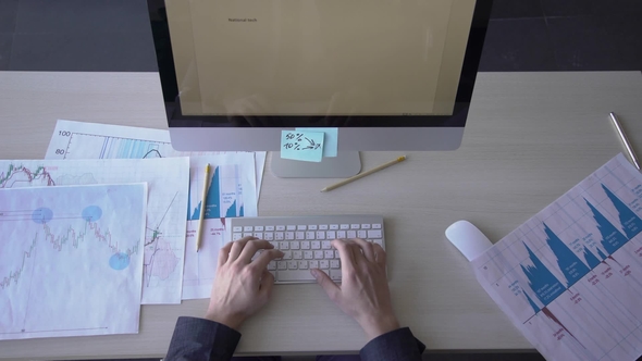 Male Hands, Which Typing IT Market Report on Computer Keyboard in the Office alt