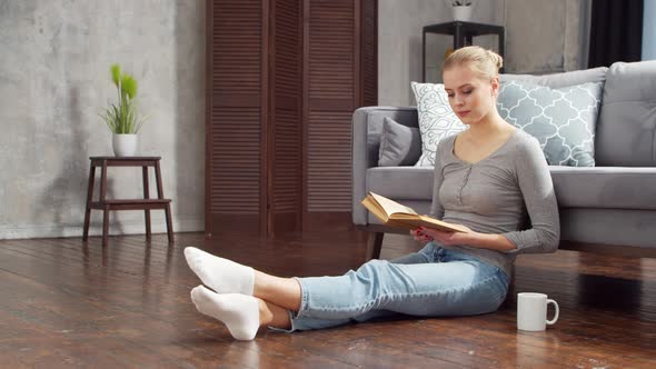 Young woman is resting at home alt