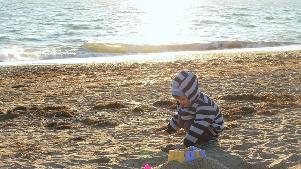 Little Boy Make a Sand Castle
