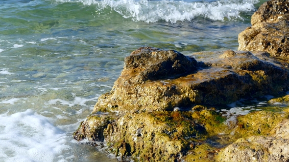 Waves Beat Against Rocks