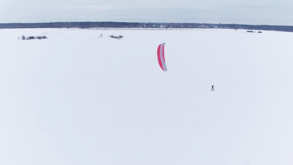 Aerial View of People Engaged in Extreme Sports in Winter