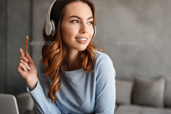 Close up portrait of a cheerful young woman - Stock Photo - Images