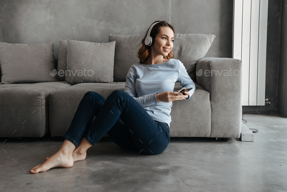 Portrait of a cheerful young woman - Stock Photo - Images