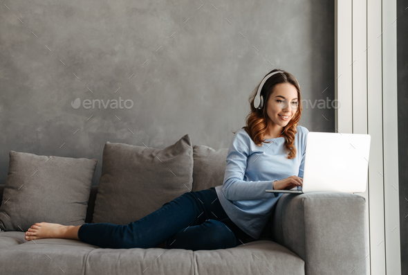 Portrait of a cheerful young woman - Stock Photo - Images