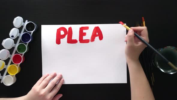 Man Draws Poster with the Slogan No War alt