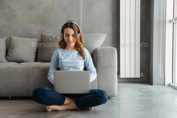 Portrait of a cheerful young woman - Stock Photo - Images