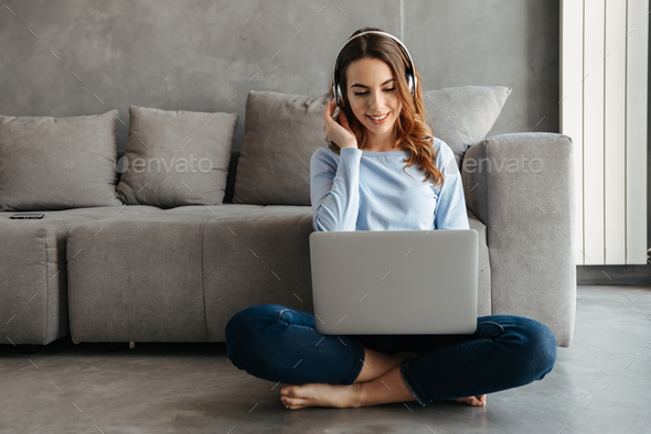 Portrait of a happy young woman - Stock Photo - Images