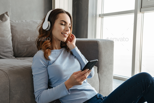 Portrait of a delighted young woman - Stock Photo - Images