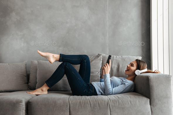 Portrait of a cheerful young woman - Stock Photo - Images